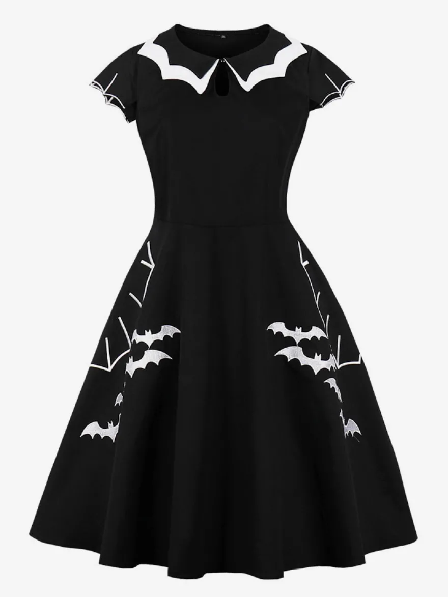 Robe cocktail vintage sans manches style swing années 1950