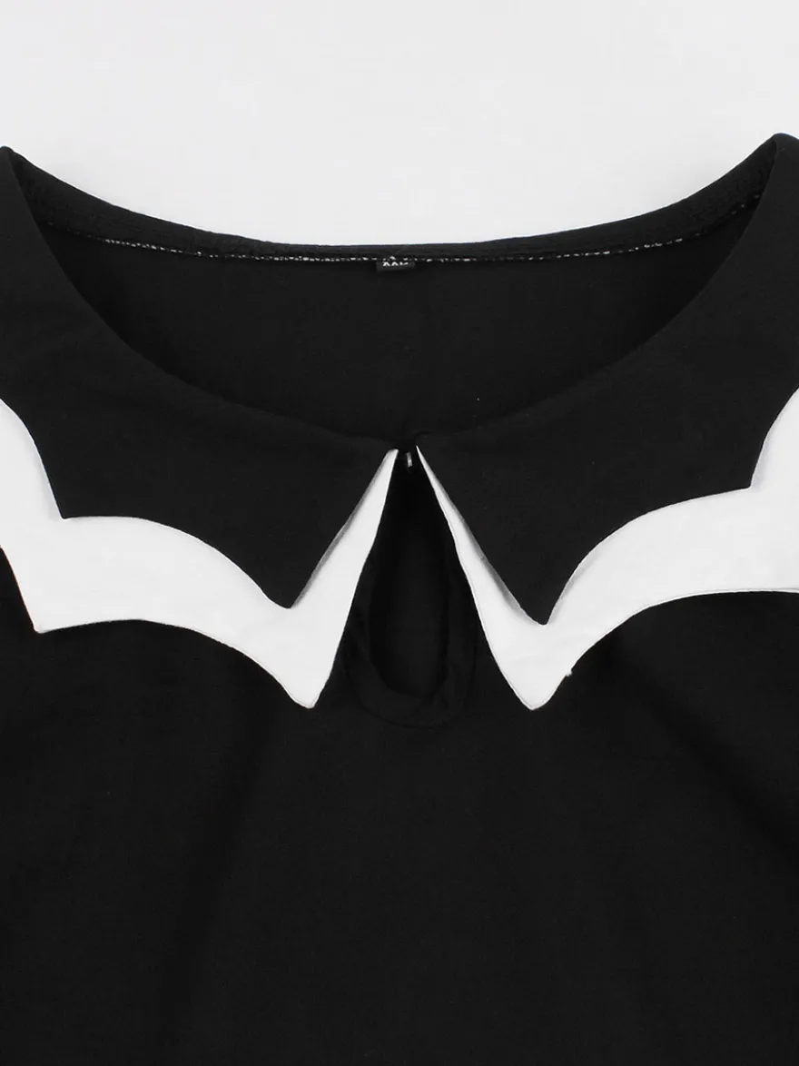 Robe cocktail vintage sans manches style swing années 1950