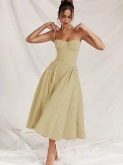 Robe corset rose pâle à bretelles spaghetti dos nu plissée mi-longue style cottagecore 2026
