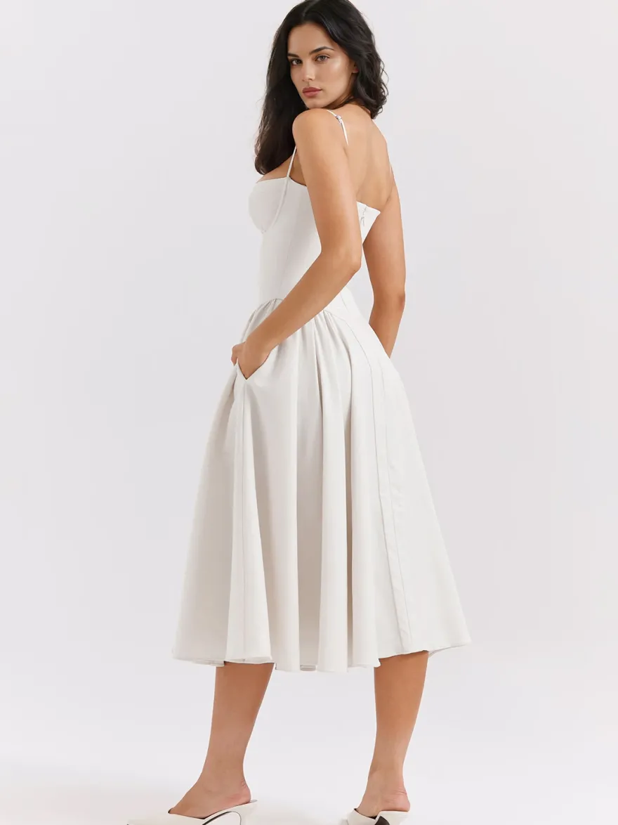 Robe corset rose pâle à bretelles spaghetti dos nu plissée mi-longue style cottagecore 2026