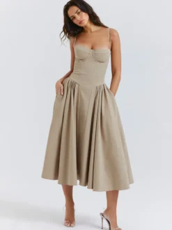 Robe corset rose pâle à bretelles spaghetti dos nu plissée mi-longue style cottagecore 2026