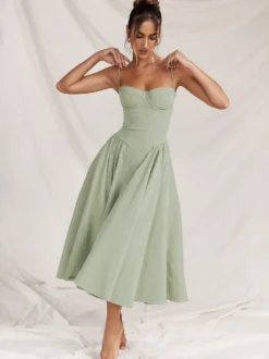 Robe corset rose pâle à bretelles spaghetti dos nu plissée mi-longue style cottagecore 2026