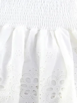Robe courte en dentelle ajourée pour femme - Robe bustier blanche à volants et smocks - Idéale pour les vacances d'été à la plage 2026