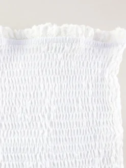 Robe courte en dentelle ajourée pour femme - Robe bustier blanche à volants et smocks - Idéale pour les vacances d'été à la plage 2026