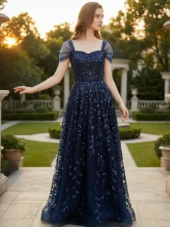 Robe de bal longue bleu profond à paillettes décolleté en cœur et épaules dénudées été 2026