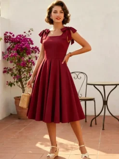 Robe de cocktail swing vintage années 1950 pour femme sans manches style rétro