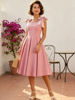 Robe de cocktail swing vintage années 1950 pour femme sans manches style rétro