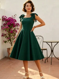 Robe de cocktail swing vintage années 1950 pour femme sans manches style rétro