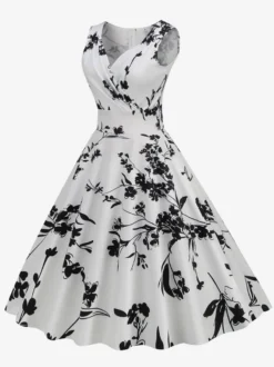 Robe de cocktail vintage années 50 col en V sans manches imprimé floral coupe trapèze taille haute sans manches.