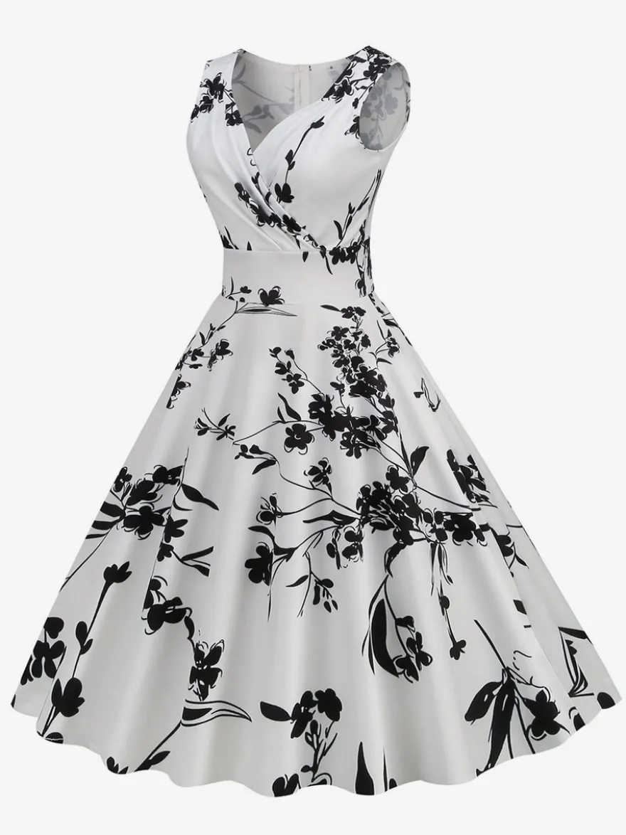 Robe de cocktail vintage années 50 col en V sans manches imprimé floral coupe trapèze taille haute sans manches.