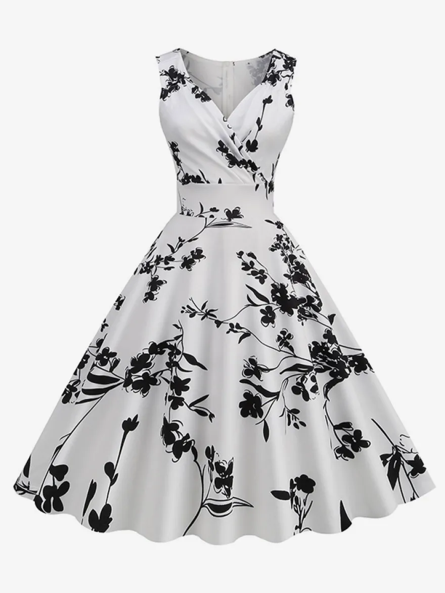 Robe de cocktail vintage années 50 col en V sans manches imprimé floral coupe trapèze taille haute sans manches.