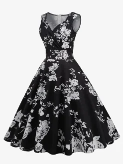 Robe de cocktail vintage années 50 col en V sans manches imprimé floral coupe trapèze taille haute sans manches.