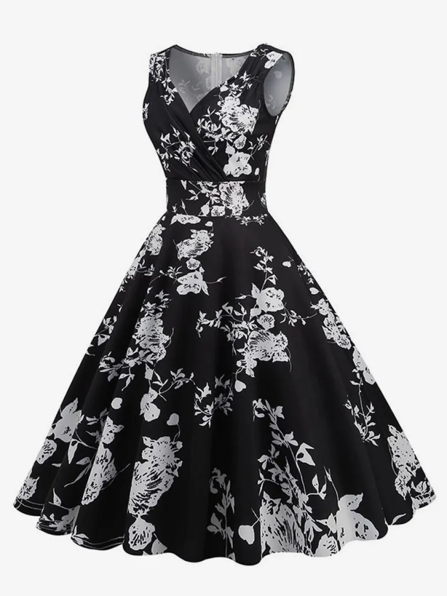 Robe de cocktail vintage années 50 col en V sans manches imprimé floral coupe trapèze taille haute sans manches.