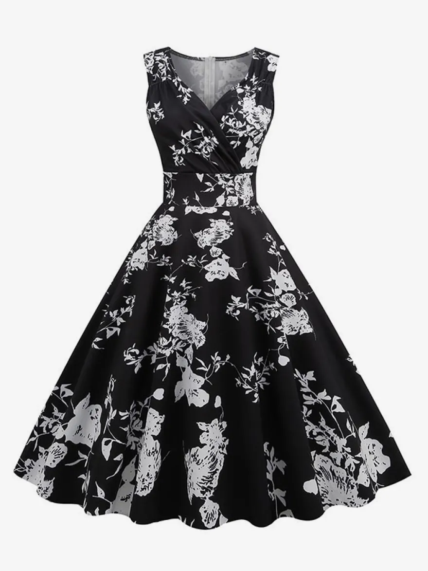 Robe de cocktail vintage années 50 col en V sans manches imprimé floral coupe trapèze taille haute sans manches.