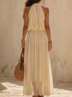 Robe de plage bohème dos nu taille élastique maxi robe fluide en mousseline style licou