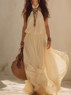 Robe de plage bohème dos nu taille élastique maxi robe fluide en mousseline style licou