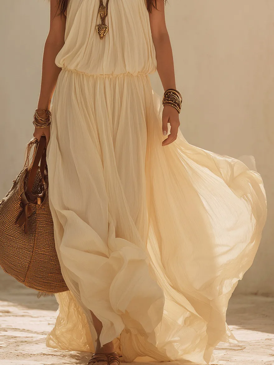 Robe de plage bohème dos nu taille élastique maxi robe fluide en mousseline style licou