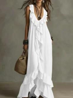 Robe de plage bohème sans manches col V ourlet à volants style maxi dos nu fluide robe longue décontractée.