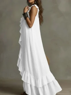 Robe de plage bohème sans manches col V ourlet à volants style maxi dos nu fluide robe longue décontractée.