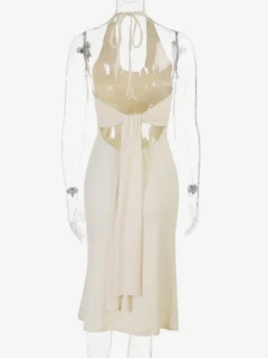 Robe de soirée Daily Dresses crème dos nu plongeant col en U ourlet fluide coupe midi bretelles fines et décolleté en U.