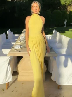 Robe de soirée jaune maxi dos nu sans manches à taille froncée longue et fluide