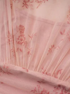 Robe de soirée longue abricot clair col montant plissée manches courtes imprimée