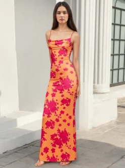 Robe de soirée longue sirène à col bénitier et bretelles spaghetti fleuries lacée