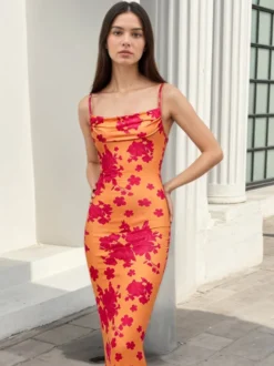 Robe de soirée longue sirène à col bénitier et bretelles spaghetti fleuries lacée
