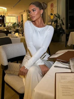 Robe de soirée maxi blanche à col rond et manches longues style semi-formel sexy