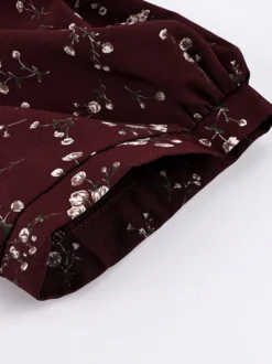 Robe de soirée maxi bordeaux à manches courtes bouffantes et col montant