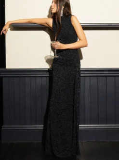 Robe de soirée maxi noire dos nu ceinturée chic et semi-formelle