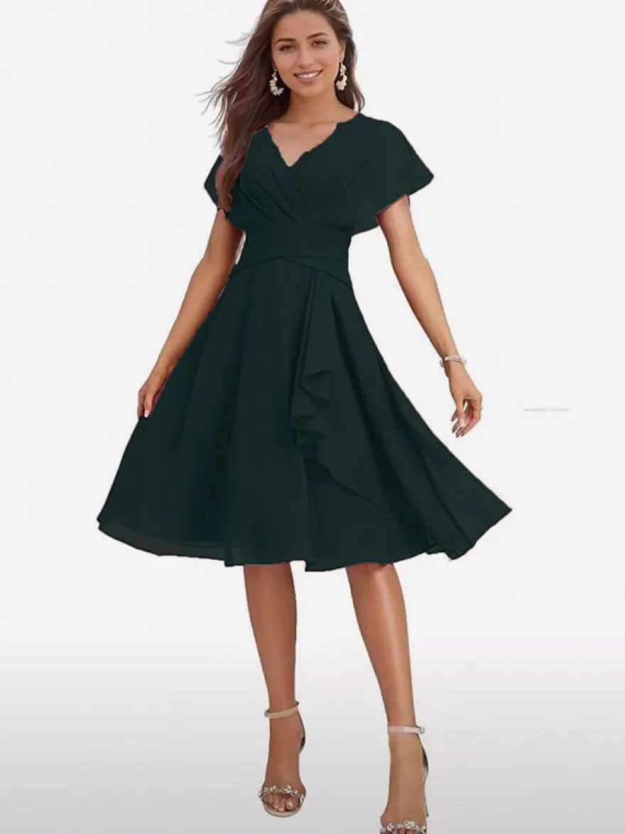 Robe de soirée midi en mousseline à col V manches papillon taille froncée et ourlet à volants.