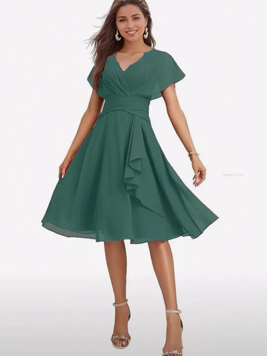 Robe de soirée midi en mousseline à col V manches papillon taille froncée et ourlet à volants.