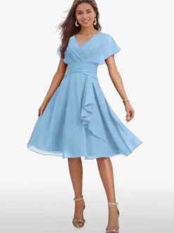 Robe de soirée midi en mousseline à col V manches papillon taille froncée et ourlet à volants.