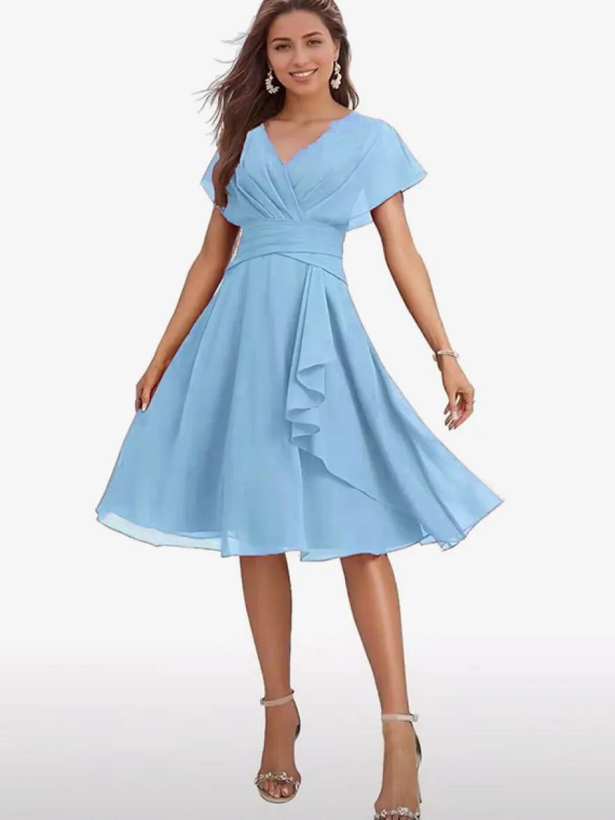Robe de soirée midi en mousseline à col V manches papillon taille froncée et ourlet à volants.