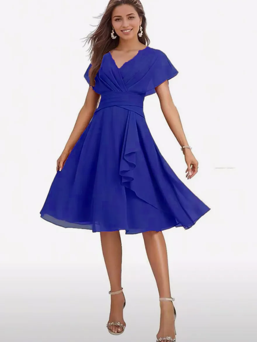 Robe de soirée midi en mousseline à col V manches papillon taille froncée et ourlet à volants.