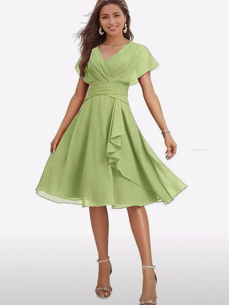 Robe de soirée midi en mousseline à col V manches papillon taille froncée et ourlet à volants.