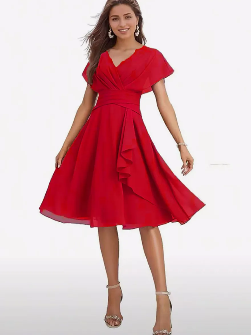 Robe de soirée midi en mousseline à col V manches papillon taille froncée et ourlet à volants.