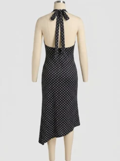 Robe de soirée midi noire à pois dos nu sans manches style semi-formel idéale pour l'été.