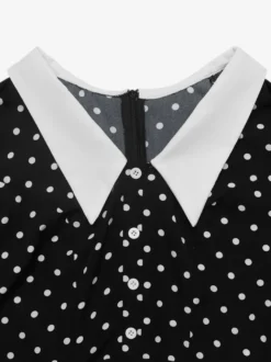 Robe de soirée mini fluide à pois col contrastant et manches longues coupe trapèze à pois.