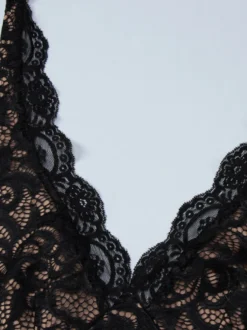 Robe de soirée noire en dentelle dos nu décolleté en V profond mini-robe moulante à volants tenue idéale pour les fêtes en boîte de nuit