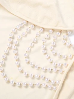 Robe de soirée sirène maxi moulante à décolleté dos nu et perles