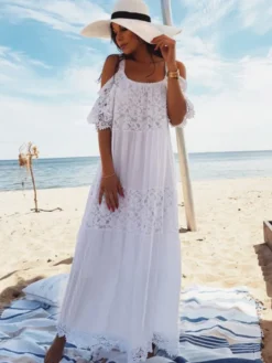 Robe de vacances en dentelle manches courtes bretelles décolleté sexy robe blanche