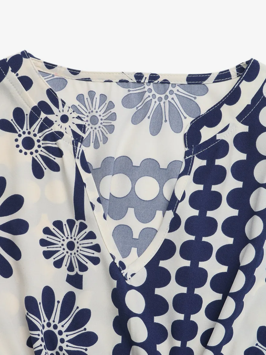 Robe de vacances fluide vintage à fleurs col en V manches bouffantes