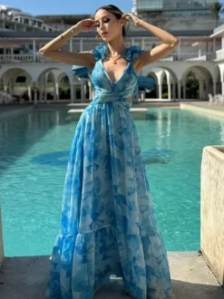 Robe de vacances à imprimé floral manches à volants dos nu et nœud à étages