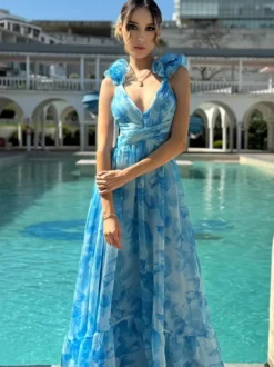 Robe de vacances à imprimé floral manches à volants dos nu et nœud à étages