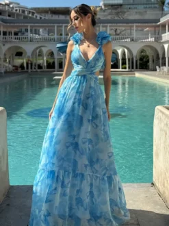 Robe de vacances à imprimé floral manches à volants dos nu et nœud à étages