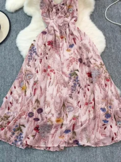 Robe de vacances maxi dos nu à fleurs bretelles fines sans manches imprimé floral col chic couleur abricot