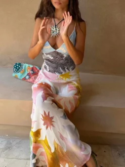 Robe de vacances maxi dos nu sans manches à imprimé floral et col en V jaune chic