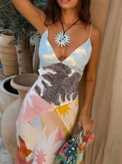 Robe de vacances maxi dos nu sans manches à imprimé floral et col en V jaune chic